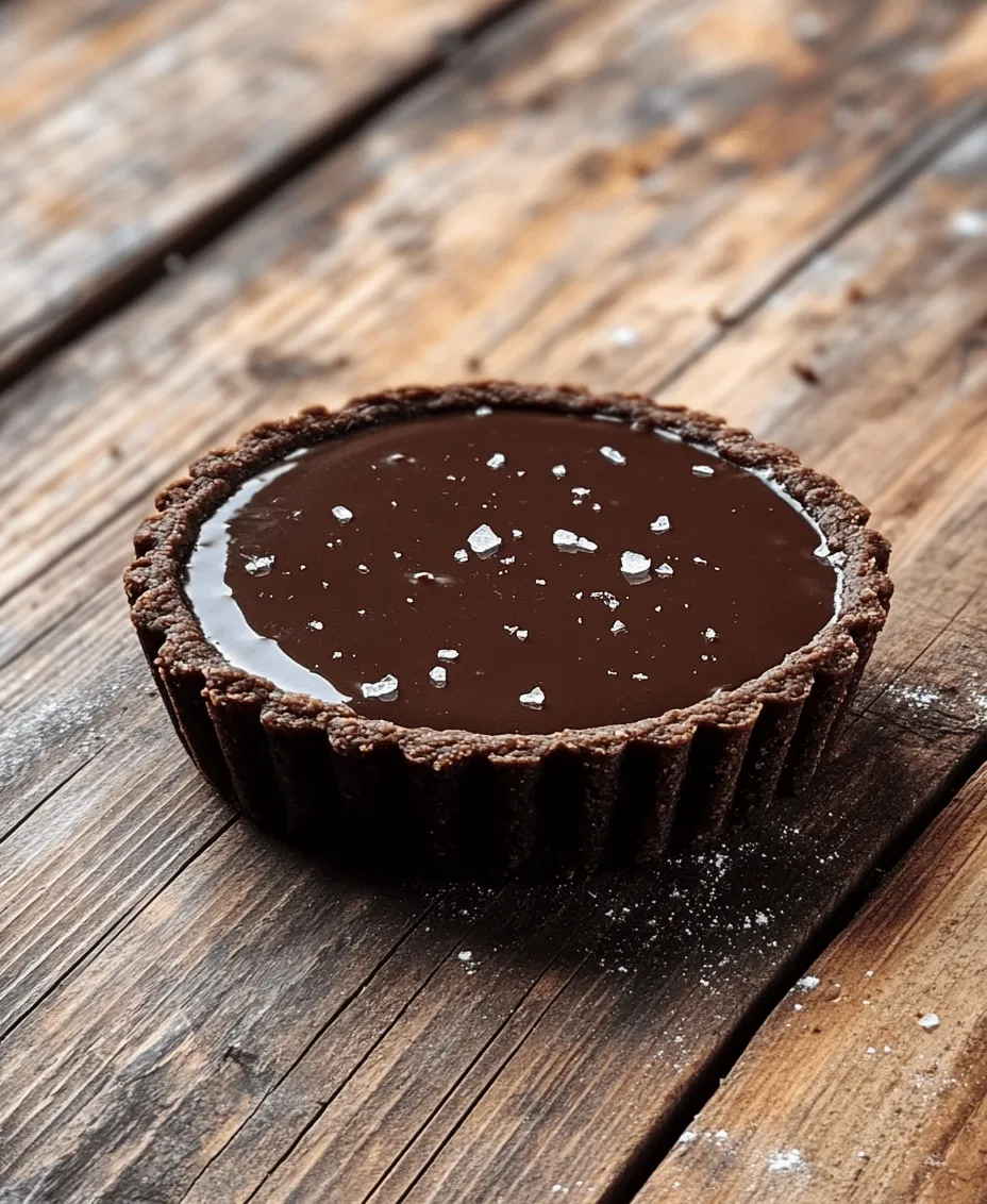 For many, the mere mention of chocolate evokes a sense of comfort and indulgence. Chocolate desserts, with their luxurious textures and rich flavors, hold a special place in the hearts of dessert lovers around the world. Among the myriad of chocolate confections, the Decadent Salted Dark Chocolate Tart stands out as a quintessential treat that caters to both the sweet tooth and the palate that craves a hint of sophistication. This tart is not just another dessert; it’s an experience—a harmonious blend of deep, dark chocolate balanced with a subtle touch of salt that elevates the flavors to new heights.
