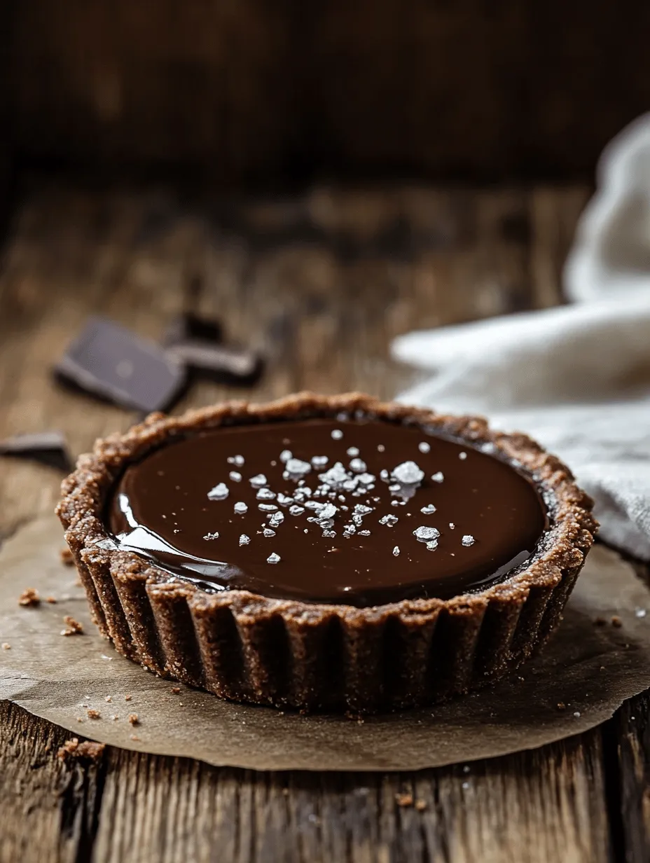 For many, the mere mention of chocolate evokes a sense of comfort and indulgence. Chocolate desserts, with their luxurious textures and rich flavors, hold a special place in the hearts of dessert lovers around the world. Among the myriad of chocolate confections, the Decadent Salted Dark Chocolate Tart stands out as a quintessential treat that caters to both the sweet tooth and the palate that craves a hint of sophistication. This tart is not just another dessert; it’s an experience—a harmonious blend of deep, dark chocolate balanced with a subtle touch of salt that elevates the flavors to new heights.