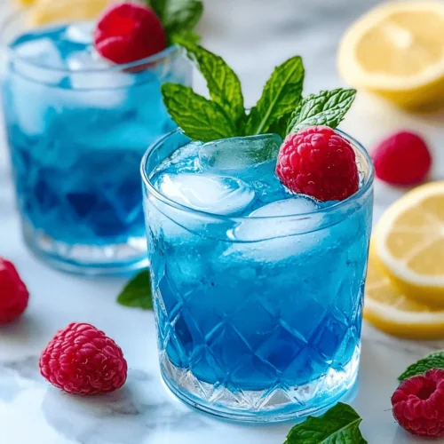 As the sun shines brightly and the temperatures rise, there’s nothing quite as refreshing as a glass of lemonade. This classic beverage has long been a summertime staple, perfect for quenching thirst on hot days, hosting backyard barbecues, or simply enjoying a peaceful afternoon on the porch. But what if we told you there’s a way to elevate this beloved drink to a whole new level? Enter Blue Raspberry Lemonade—a vibrant, flavorful twist that promises to captivate both children and adults alike.