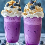 Indulge your senses with the delightful Blueberry Bliss Cheesecake Milkshake, a creamy concoction that marries the luscious taste of fresh blueberries with the rich essence of classic cheesecake. This milkshake isn't just another dessert; it’s a celebration of flavor and texture that encapsulates the essence of summer berries while providing a nostalgic nod to the beloved cheesecake dessert. With its vibrant purple hue and inviting aroma, it’s the perfect treat to cool down on a hot day or to satisfy your sweet cravings any time of year.